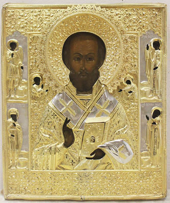 Старинная икона "Николай Чудотворец" в серебряном окладе с предстоящими архангелом Михаилом и преподобный Сергием Радонежским