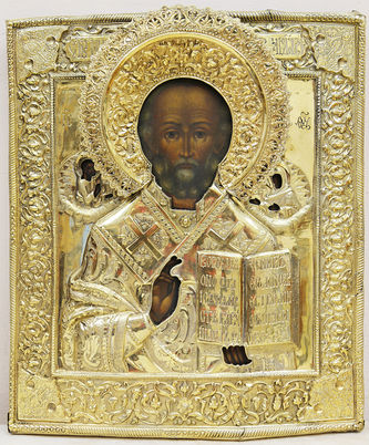 Старинная икона "Николай Чудотворец" в окладе с цветочно-растительным орнаментом