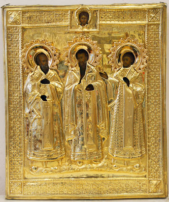 Старинная икона "Собор трёх святителей: Григорий Богослов, Василий Великий и Иоанн Златоуст" в окладе
