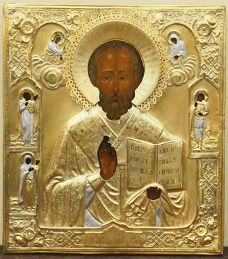 Мастер-ювелир Мухин Александр Алексеев
Старинная икона "Николай Чудотворец с предстоящими" в окладе с цветами