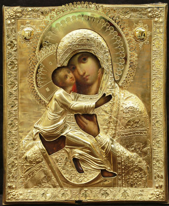 Старинная икона "Владимирская Богоматерь" в окладе с цветочным рисунком